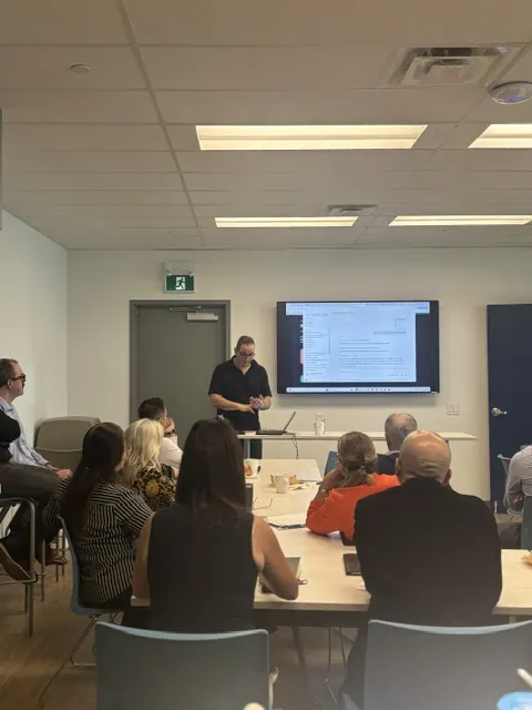 Action AI on-site AI Lunch and Learn in a company boardroom in Toronto