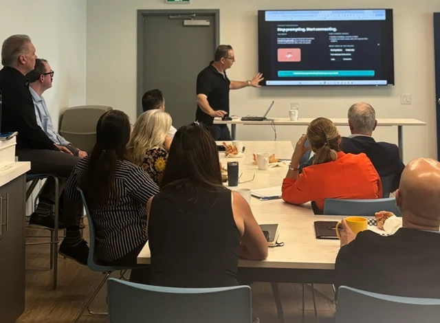 Action AI lunch and learn session running in a Toronto office boardroom